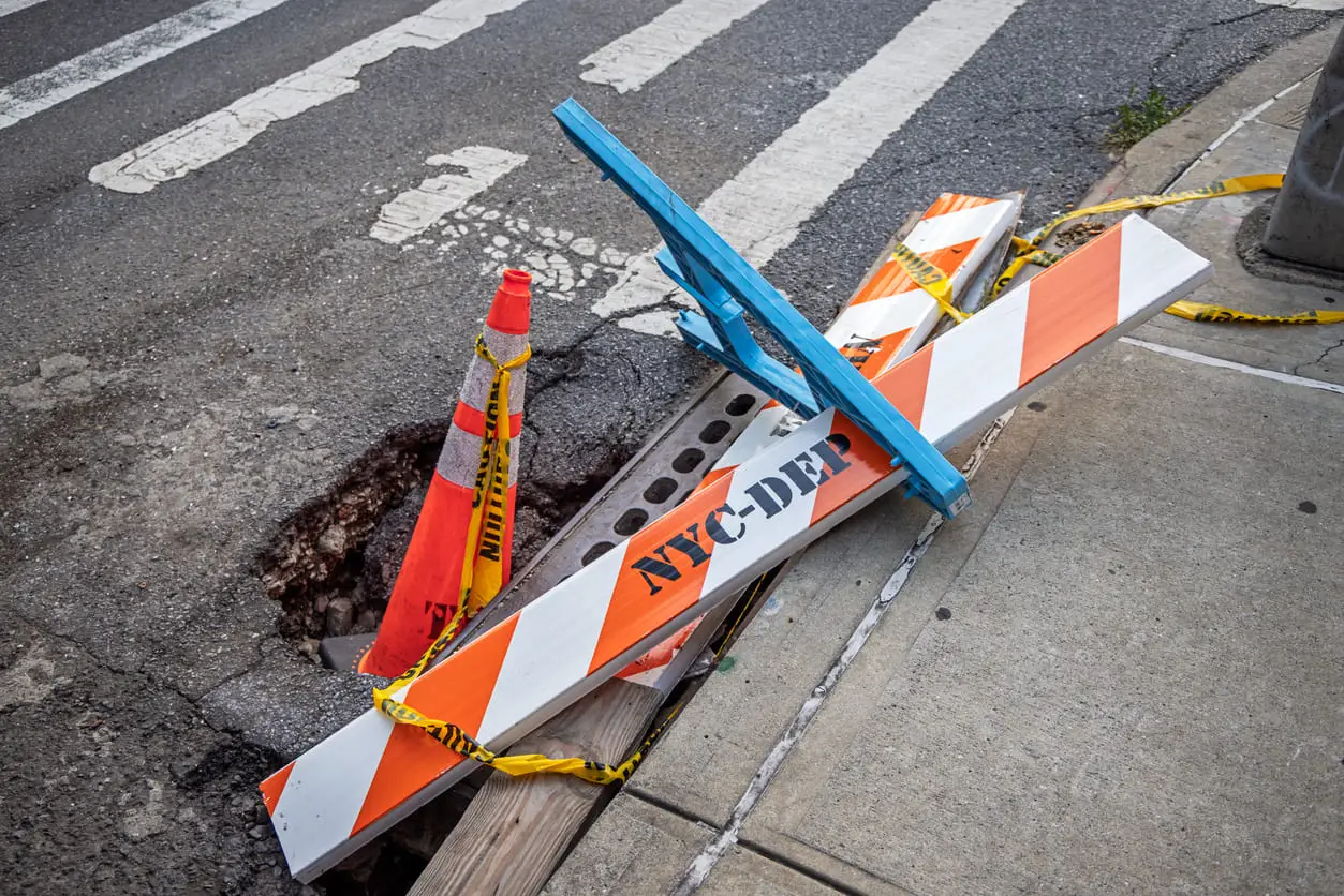 Potholes cause crashes in Queens, NY Potholes cause crashes in Queens, NY